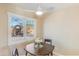 Cozy dining room with a window view of the landscaped backyard at 1301 E Belmont Ave, Phoenix, AZ 85020