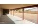 Covered patio overlooking the large, gravel backyard at 13439 N 16Th Ave, Phoenix, AZ 85029