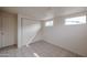 Bedroom featuring windows, a closet and bright paint at 13439 N 16Th Ave, Phoenix, AZ 85029