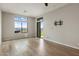 Bright bedroom with a sliding door, mountain views, hardwood floors and a wall mounted TV bracket at 13763 N Campsite Ct, Fountain Hills, AZ 85268