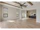 Open concept living room and kitchen with high ceilings and modern finishes at 13763 N Campsite Ct, Fountain Hills, AZ 85268