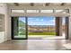 Stunning view from the sliding glass doors to the outdoor space with artificial grass at 13763 N Campsite Ct, Fountain Hills, AZ 85268