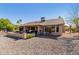 Back of house featuring a patio, BBQ and desert landscaping at 14430 W White Rock Dr, Sun City West, AZ 85375