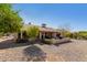 Back of house featuring a patio, BBQ and desert landscaping at 14430 W White Rock Dr, Sun City West, AZ 85375