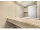 Bright bathroom showcasing a floating vanity, a large mirror, and modern fixtures at 14430 W White Rock Dr, Sun City West, AZ 85375