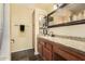 Bathroom with granite countertops, dual mirrors, and a clean, modern design at 14430 W White Rock Dr, Sun City West, AZ 85375