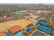 An aerial view of athletic facilities including a track, football field, and baseball field at 15229 E Marigold Ct, Fountain Hills, AZ 85268