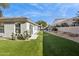 Spacious backyard featuring lush artificial grass, desert landscaping, and privacy fencing at 15229 E Marigold Ct, Fountain Hills, AZ 85268