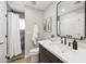 Modern bathroom with a sleek vanity, contemporary fixtures, and tiled walk-in shower at 15229 E Marigold Ct, Fountain Hills, AZ 85268