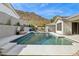 Inviting backyard pool with mountain views, lounge seating, and stylish landscaping at 15229 E Marigold Ct, Fountain Hills, AZ 85268