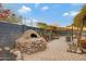 A charming backyard showcases a wood-fired pizza oven at 1546 W Polk St, Phoenix, AZ 85007