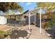 Backyard cottage with cozy seating and a charming outdoor living space at 1546 W Polk St, Phoenix, AZ 85007