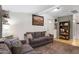 Inviting living room featuring comfortable sofas, a neutral color palette, and ample space for relaxation at 1546 W Polk St, Phoenix, AZ 85007