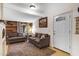 Comfortable living room showcasing rustic wood accents, cozy seating, and bright, natural lighting at 1546 W Polk St, Phoenix, AZ 85007