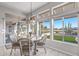 Bright dining area featuring a view of the golf course at 15701 W Huron Dr, Sun City West, AZ 85375