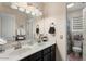 Well-lit bathroom featuring dual sinks, ample counter space, and a separate toilet area at 1651 E Kielly Ln, Casa Grande, AZ 85122