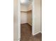 Walk-in closet with ample shelving and carpeting at 1655 W Wilson Ave, Coolidge, AZ 85128