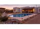 Beautiful pool view with desert plants and night lighting at 1775 N Starr Rd, Apache Junction, AZ 85119