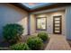 Charming entryway with desert landscaping and brick-paved walkway at 18024 E Wolf Tree Ln, Rio Verde, AZ 85263