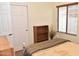 Cozy bedroom featuring natural light with closet and neutral walls at 1813 N Lewis Pl, Casa Grande, AZ 85122