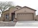 Appealing single-story home with a two-car garage, well-kept desert landscaping, and a cozy front entrance at 1813 N Lewis Pl, Casa Grande, AZ 85122