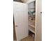 Pantry with white shelving and plenty of room for storage at 1813 N Lewis Pl, Casa Grande, AZ 85122