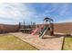 Wonderful backyard with playground, trampoline and sandbox at 18609 W Diana Ave, Waddell, AZ 85355