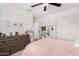 Bright bedroom featuring light walls, carpeted floors, and a large dresser at 18609 W Diana Ave, Waddell, AZ 85355