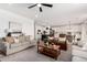 Open concept living room showing the kitchen and dining area beyond at 18609 W Diana Ave, Waddell, AZ 85355