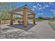 Shaded picnic area with seating provides a relaxing spot for outdoor dining and community gatherings at 18609 W Diana Ave, Waddell, AZ 85355