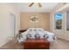 Comfortable bedroom with bright decor, and a view at 18668 N Lariat Ct, Surprise, AZ 85387