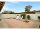 Serene backyard offering privacy and a peaceful retreat with manicured landscape and seating at 1930 S Westwood Dr # 29, Mesa, AZ 85210