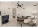 Bright living room with neutral paint, tile flooring, and comfortable seating arrangement at 1973 E Buena Vista Dr, Chandler, AZ 85249