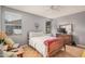 Spacious main bedroom featuring wood floors, neutral walls and two windows at 1973 E Buena Vista Dr, Chandler, AZ 85249