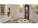 Elegant foyer featuring decorative tile inlay, recessed lighting, and classic grandfather clock at 20187 E Sonoqui Blvd, Queen Creek, AZ 85142