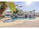 Backyard pool with well-manicured landscaping and a patio area, creating a serene oasis at 20187 E Sonoqui Blvd, Queen Creek, AZ 85142