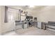 Bedroom with an L-shaped desk and a ceiling fan at 2021 S 84Th Ave, Tolleson, AZ 85353