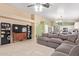 Open-concept living room with comfortable seating and neutral tones, perfect for relaxation at 2021 S 84Th Ave, Tolleson, AZ 85353