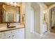 Bathroom featuring dual sinks with large mirrors at 20704 N 90Th Pl # 1065, Scottsdale, AZ 85255