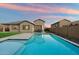 Inviting backyard with a refreshing pool and ample space for relaxation and entertainment at 20954 E Camacho Ct, Queen Creek, AZ 85142