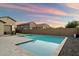 Private backyard oasis boasts a pristine pool with a modern design, ideal for leisure and recreation at 20954 E Camacho Ct, Queen Creek, AZ 85142