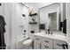 This bathroom offers sleek finishes, matte black fixtures, stylish decor, and a subway tile shower at 20954 E Camacho Ct, Queen Creek, AZ 85142