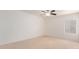 Bedroom featuring neutral walls, carpet, ceiling fan and a window at 21629 N Dietz Dr, Maricopa, AZ 85138