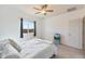 Relaxing bedroom featuring a bed, a window that offers natural light and soft decor at 21889 N 259Th Ave, Buckeye, AZ 85396