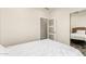 Bright bedroom with a mirrored closet and a contemporary door at 2227 W Cambridge Ave, Phoenix, AZ 85009