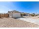 Attractive home featuring low-maintenance landscaping and a concrete driveway at 2227 W Cambridge Ave, Phoenix, AZ 85009