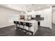 Modern kitchen featuring stainless steel appliances, a large island, and sleek cabinetry at 2227 W Cambridge Ave, Phoenix, AZ 85009