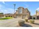 Stunning two-story home with well-manicured landscaping and a three-car garage, offering ample parking space at 2419 E Goldenrod St, Phoenix, AZ 85048