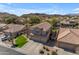 Beautiful home featuring a well-maintained lawn, desert landscaping, and a three car garage at 2419 E Goldenrod St, Phoenix, AZ 85048