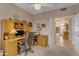 Inviting home office with view of the staircase and hallway at 2419 E Goldenrod St, Phoenix, AZ 85048